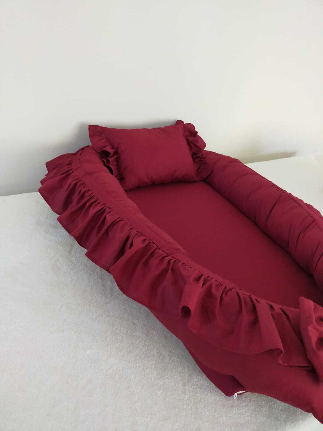 baby nest red with ruffles