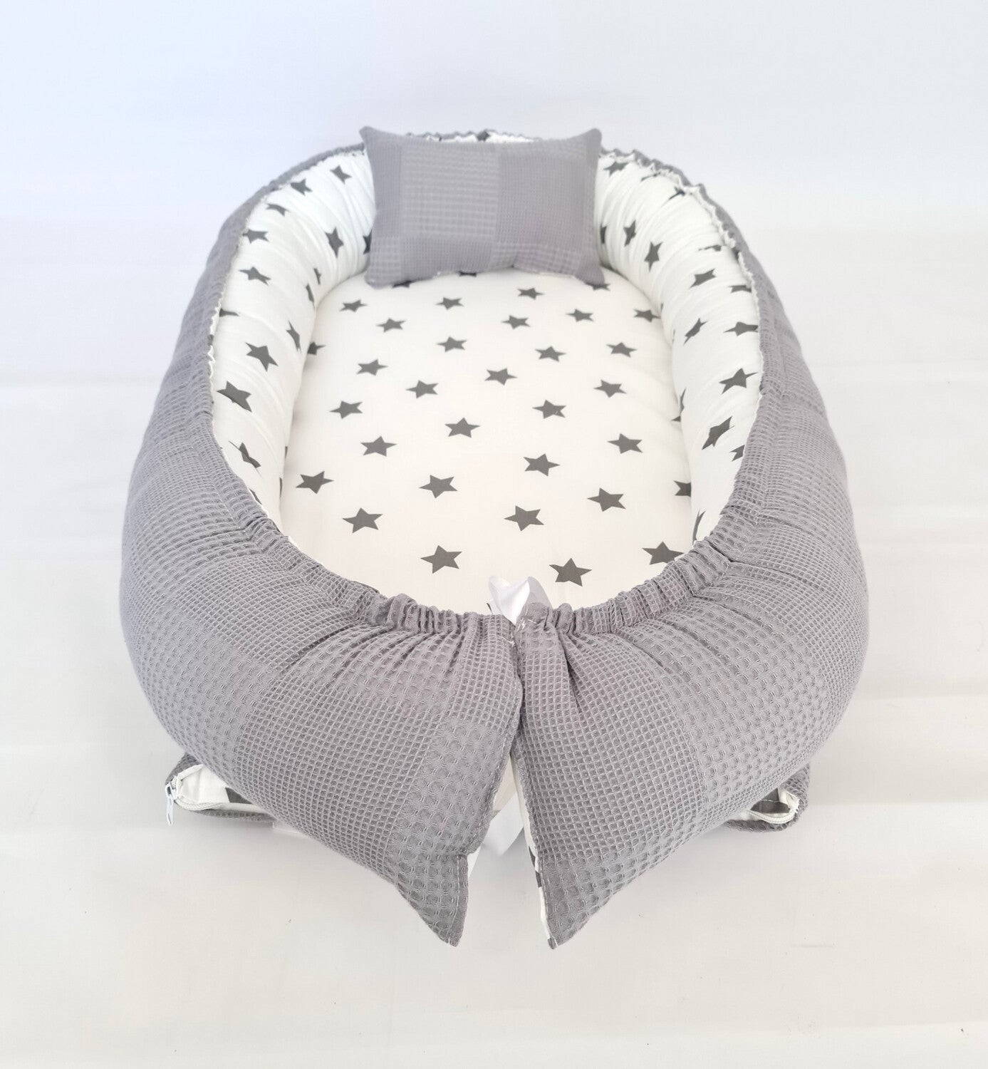 Baby nest gray white stars