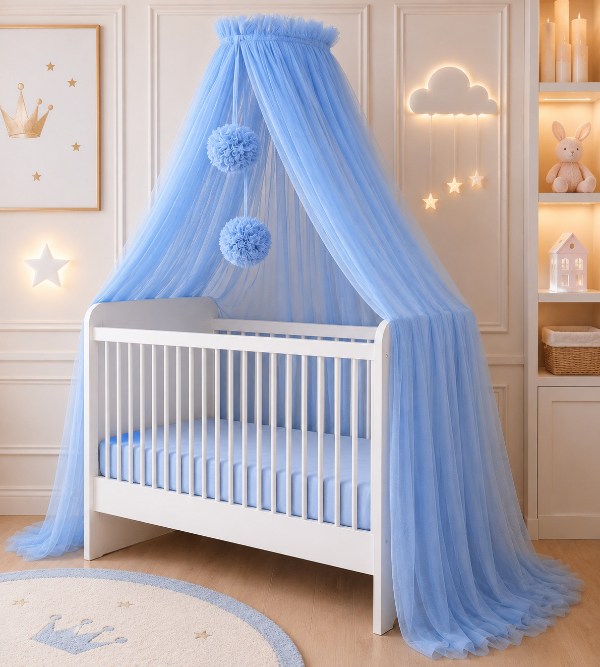 blue bed canopy with pompoms