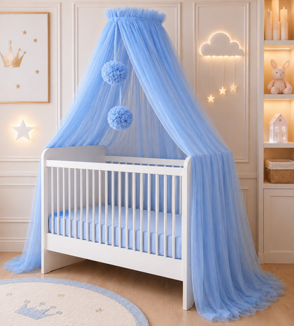 blue bed canopy with pompoms