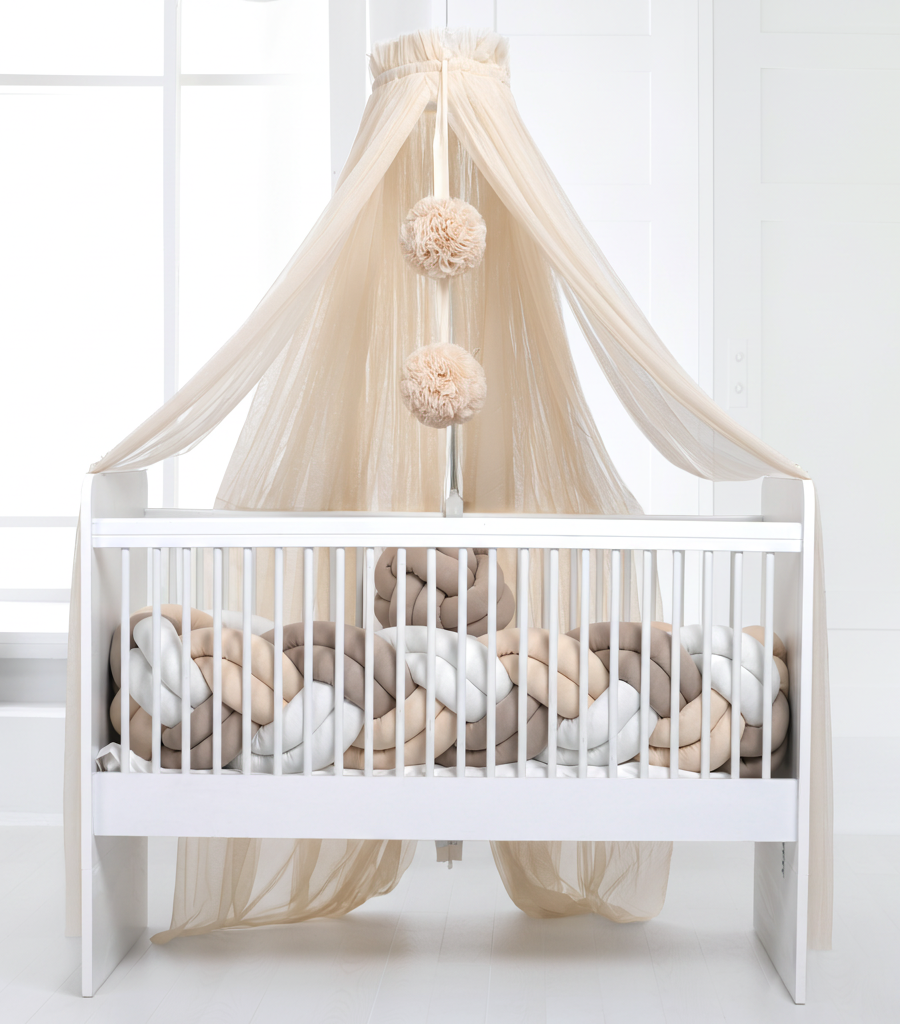 Light beige bed canopy with bobbles