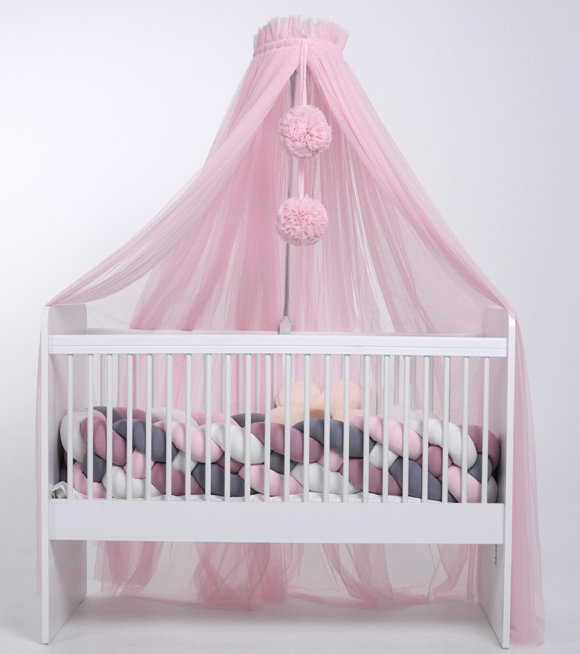 pink bed canopy with pompoms