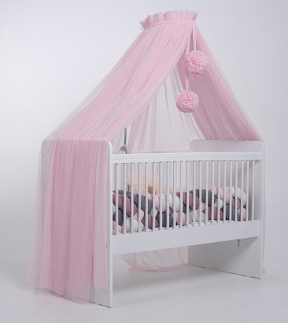 pink bed canopy with pompoms